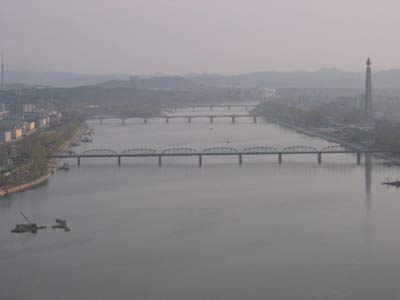 Morning mist over the Taedong River. The Juche tower can be seen on the right of the picture